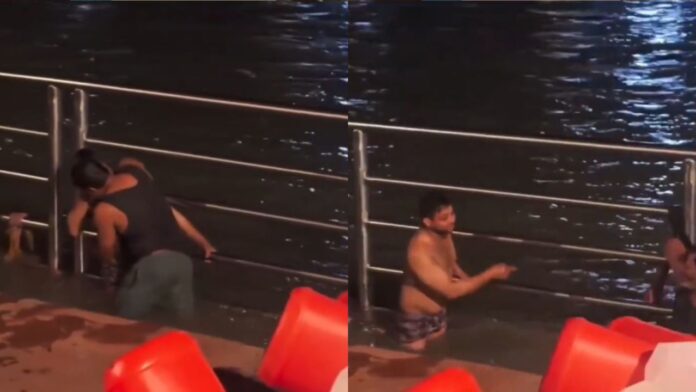 Four boys teased girls, then kissed each other during a bath in the Ganges in Haridwar. Four boys teased girls, then kissed each other during a bath in the Ganges in Haridwar