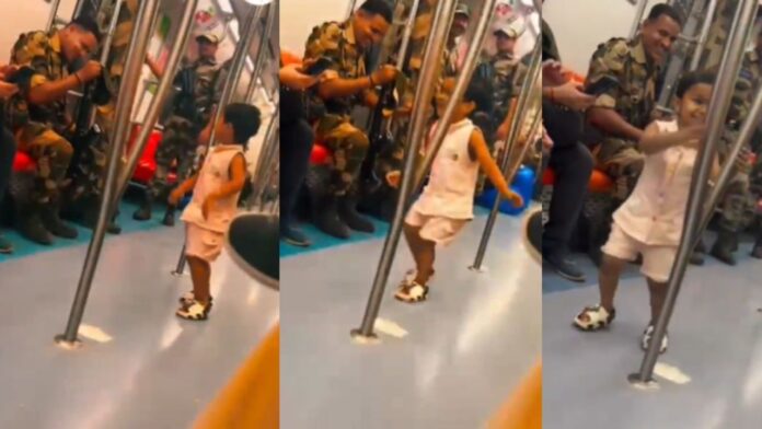 Delhi Metro viral video , little girl salutes CISF Jawan Delhi Metro viral video , little girl salutes CISF Jawan