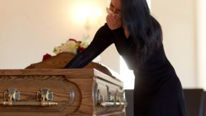 China Woman Humming from Coffin